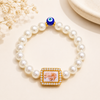White_Pearl_Guru_Ji_Bracelet_with_Evil_Eye_Charm